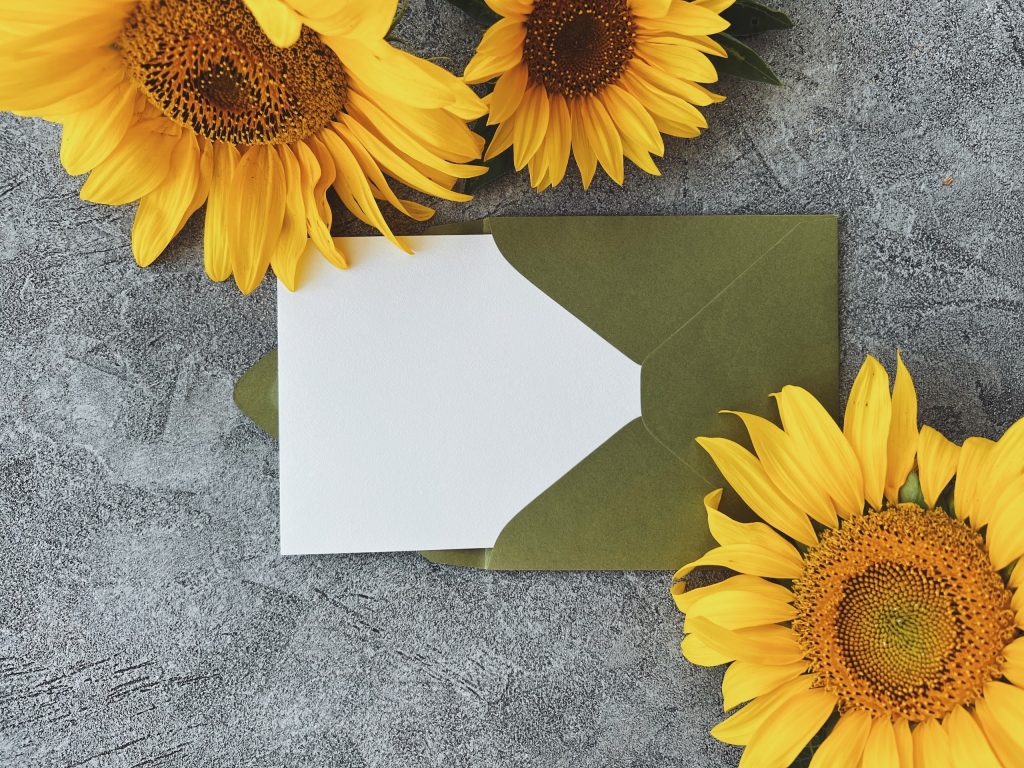 sunflowers with paper envelope